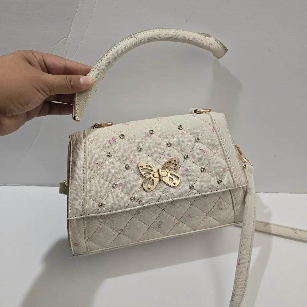 Under One Sky Cream Quilted Crossbody Bag with Gold Butterfly